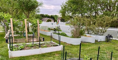 A ANLEOLIFE 6-Piece 18 Inch Tall Antique White Raised Garden Beds Kit, Heart-Shaped & Long Oval Planters for Custom Decorative Gardens.
